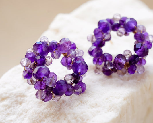 Combining the elegance of wire wrapping with the luxurious beauty of amethyst bead circle stud earrings. The rich purple hue complements any outfit and adds a touch of sophisticated glamour to any look.