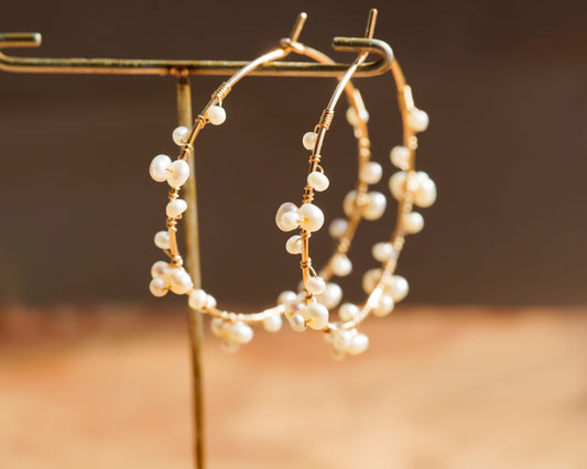 Tiny pearl wire wrapped gold hoop